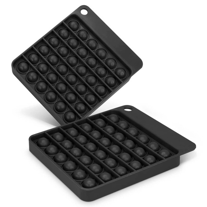 A black Pop Bubble Board with two sections, each filled with multiple bubble-like domes.