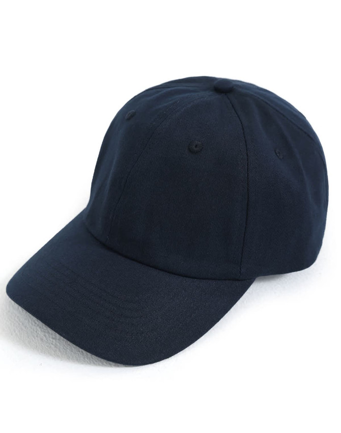 A navy blue cotton twill unstructured cap with a curved brim and ventilation eyelets, featuring a logo.