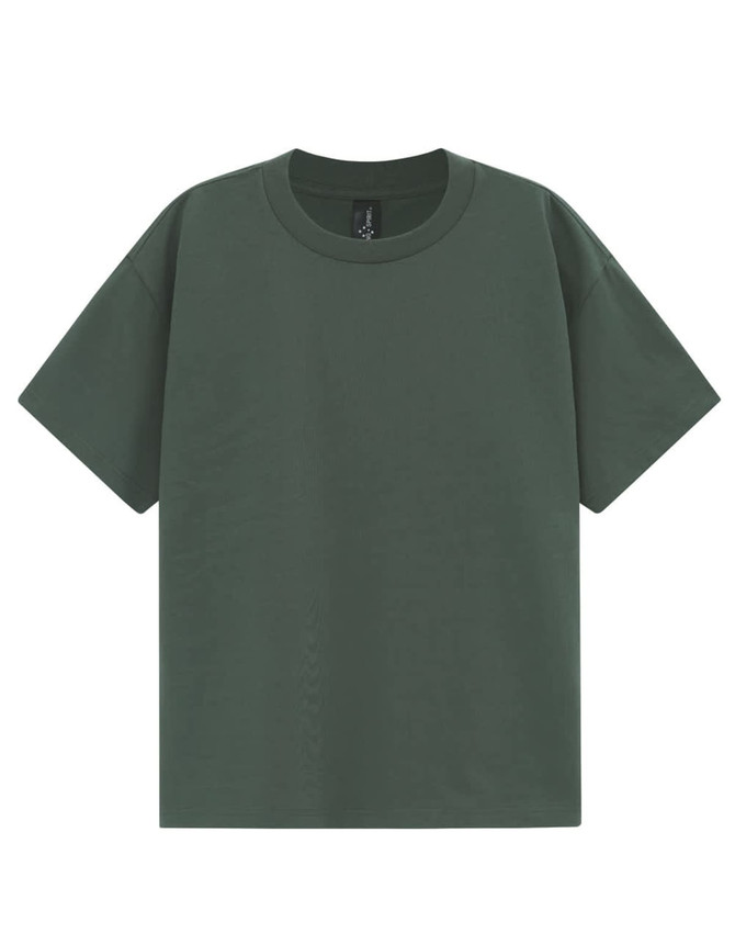 A green unisex heavy cotton oversized tee with a relaxed fit and round neckline. It features a logo on the label.