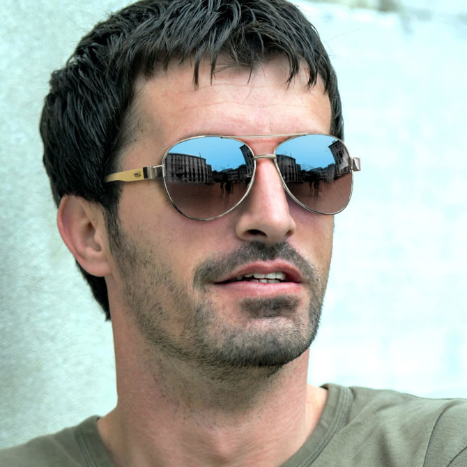 Aviator sunglasses with mirror lenses and bamboo accents, featuring a brown tint and a metallic finish.