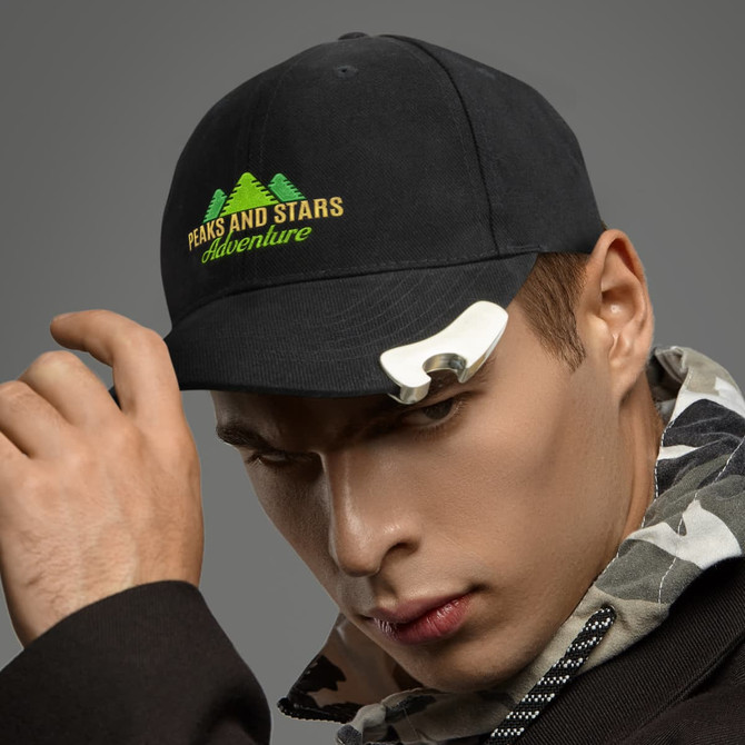 A drink bottle opener cap in black with a silver opener attachment, featuring a logo with green trees on the front.