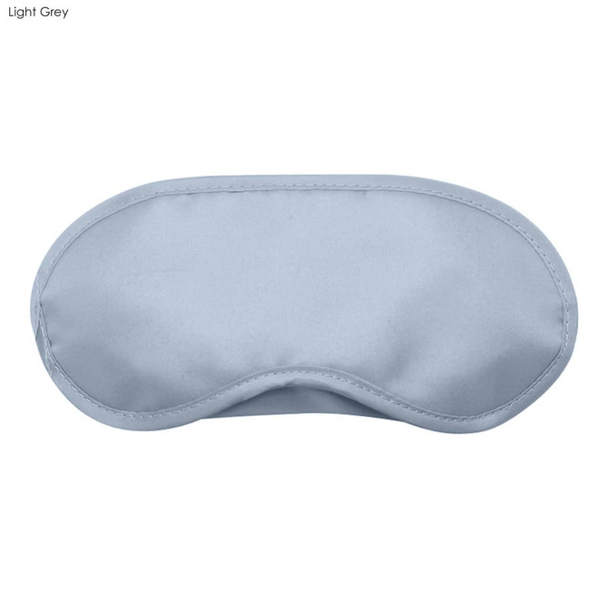 A light grey sleep eye mask with a smooth surface and curved shape, featuring a logo.