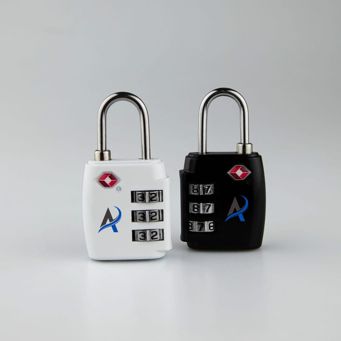 Two portable TSA luggage locks in white and black, featuring combination dials and a logo on each.