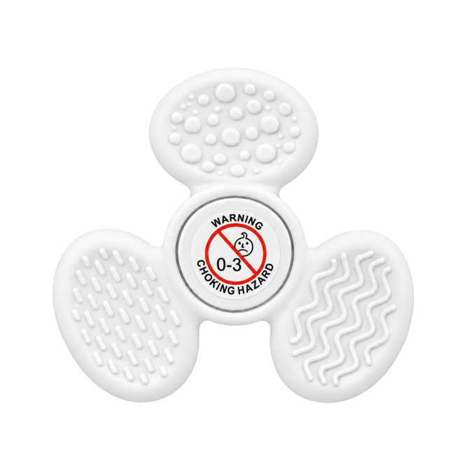 A white tactile fidget spinner with textured surfaces and a central warning label. It features different tactile patterns.