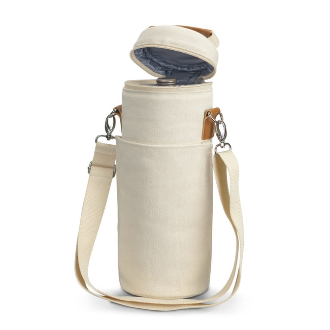 A cream wine cooler bag with a detachable strap and a soft inner lining, featuring a lid and leather accents.
