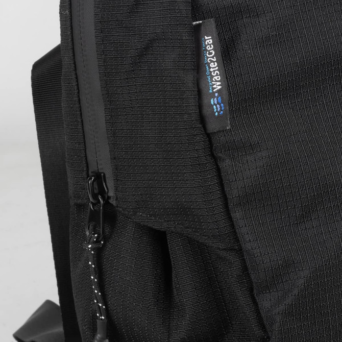 A black laptop bag with textured fabric and a zipper, featuring a logo on the side.