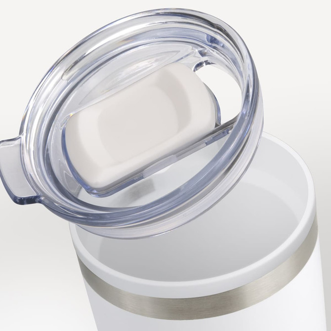 A double wall cup in white, with a clear lid and silver band. The lid features a sliding opening for drinking.
