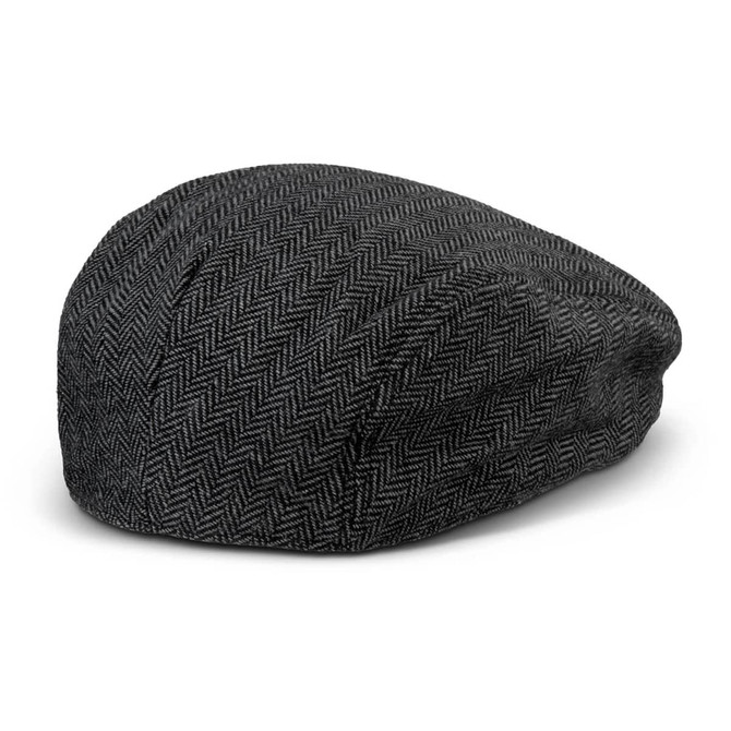 A flat cap in grey herringbone pattern with a structured design and a small logo.