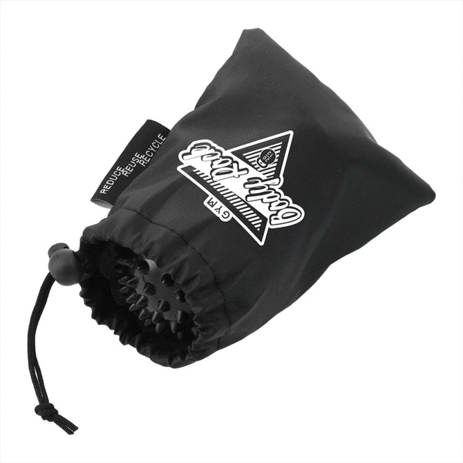 A black drawstring pouch containing two massage balls, featuring a logo on the front.