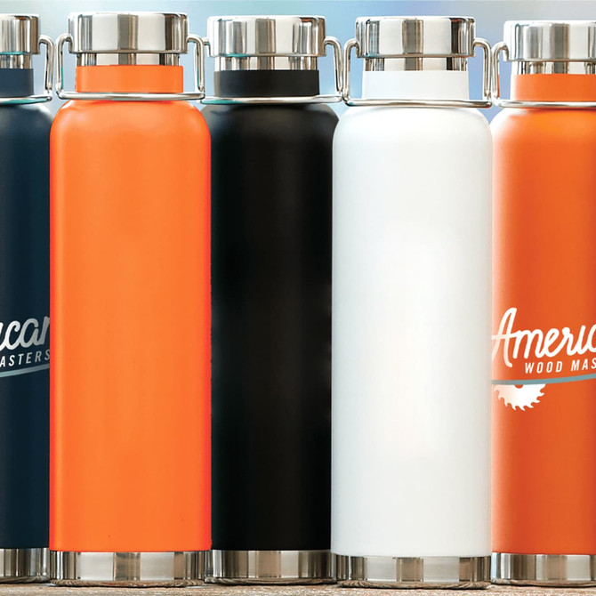 A drink bottle in orange, black, white, and navy with stainless steel accents and a logo.