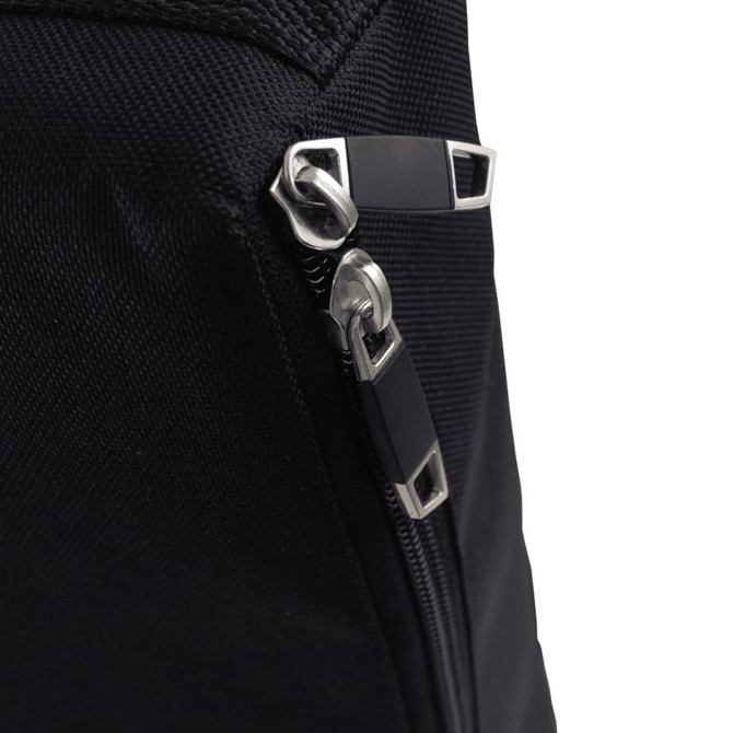 A close-up of a black fabric with a silver zipper and metal accents, featuring a sleek, modern design.