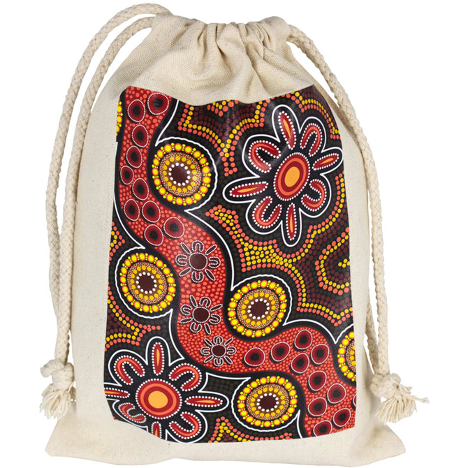 A drawstring bag featuring Aboriginal art with vibrant red, yellow, and black patterns.