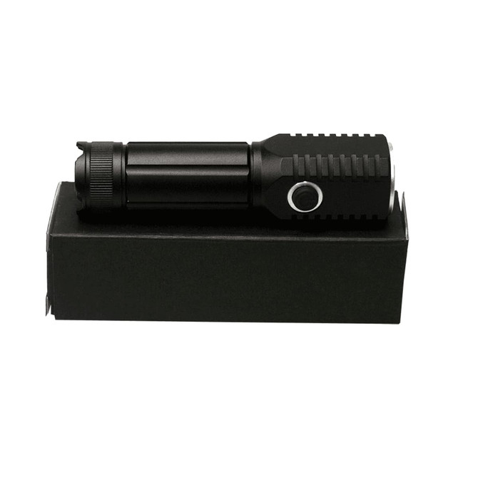A black LED torch featuring a textured grip and a button, placed on a black box.