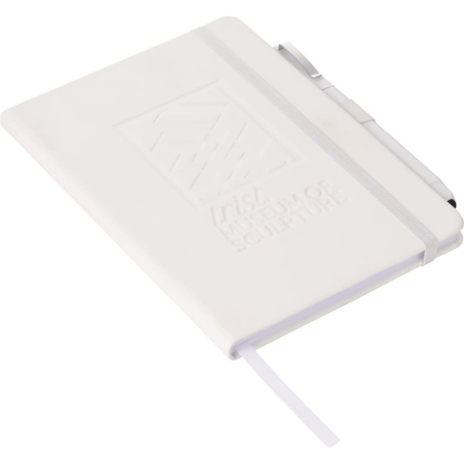 A white hard bound journal with an elastic strap and a branding logo on the cover.