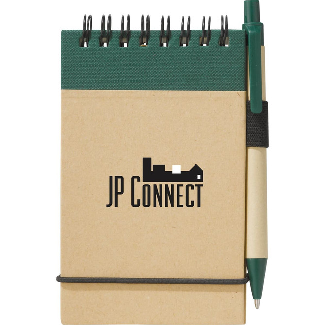 A tan recycled notepad with a green cover and a green pen attached, featuring a logo on the front.