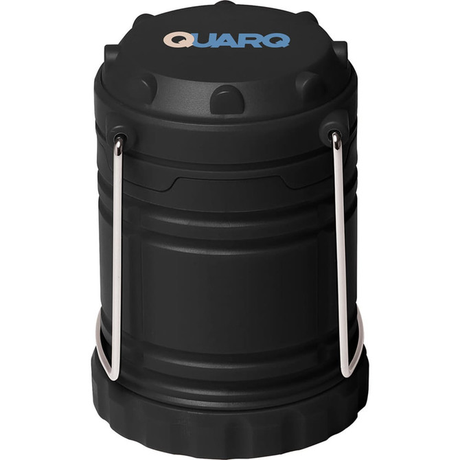 A compact black Mini COB Pop Up Lantern with a silver handle and a logo on the top.