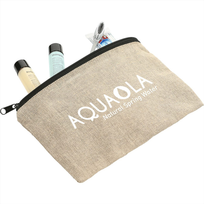 A beige recycled cotton twill pouch with a zip, containing toiletries and a toothbrush, featuring a logo.