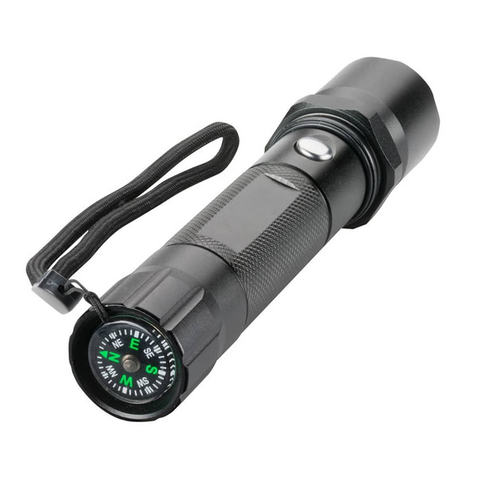 A black torch with a compass attached, featuring a textured grip and a wrist strap.