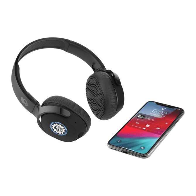 Black Skullcandy Riff Wireless headphones alongside a smartphone displaying a music app. The headphones feature a logo.