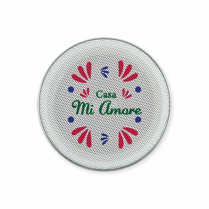 A circular speaker with a floral design in pink, green, and blue, featuring the text “Casa Mi Amore.”