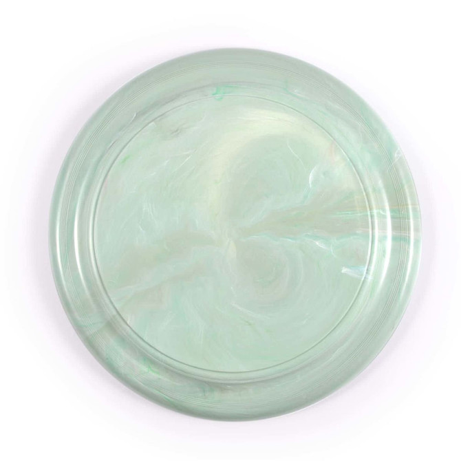A green, marbled frisbee made from recycled materials, showcasing a smooth, circular design.