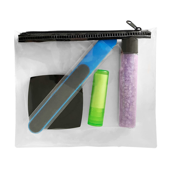 A clear pouch containing a nail file, lip balm, and a container of purple bath salts, alongside a black compact.