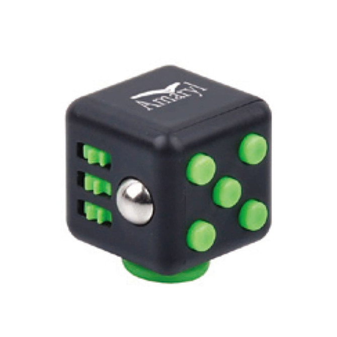 A black stress reliever cube featuring green buttons, a metallic ball, and a logo on one side.