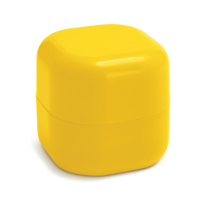 A yellow, square lip balm container with a glossy finish and a small logo on the side.
