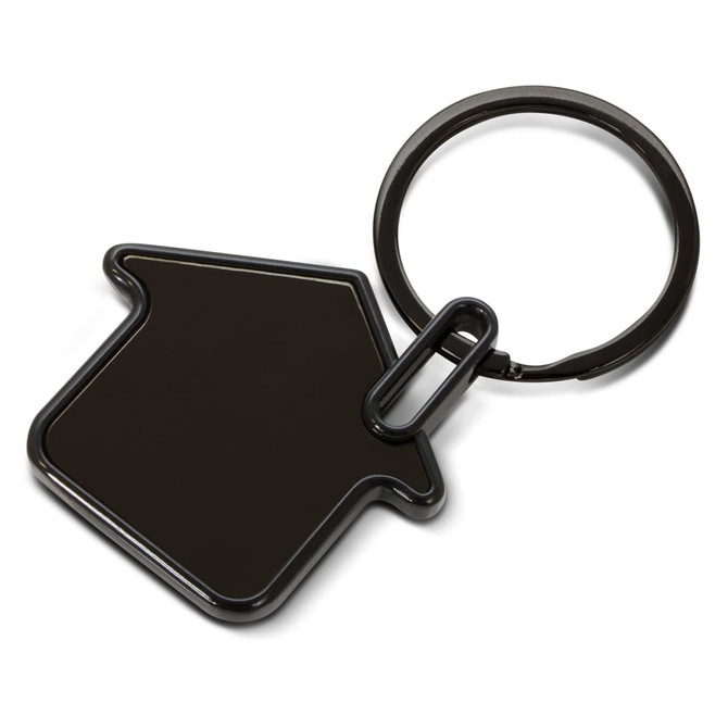 A house-shaped key ring in black, featuring a circular metal keychain. It has a sleek and simple design.