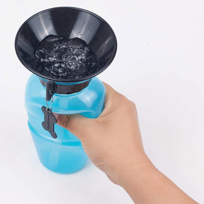 A drink bottle with a blue body and black funnel, featuring a paw-shaped attachment.