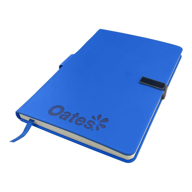 A blue premium notebook with a clasp and a logo on the cover. It features lined pages and a bookmark ribbon.