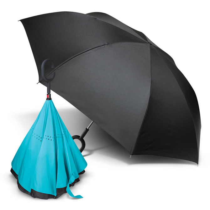 An inverted umbrella featuring a black exterior and a turquoise interior, designed to trap rainwater inside when closed.