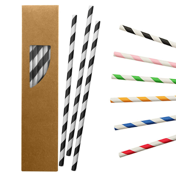A box containing paper straws in black and white, with additional straws in various colours, including red, green, and pink.
