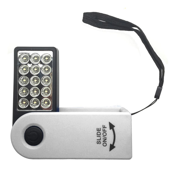A compact white torch with a black panel featuring multiple LED lights and a sliding on/off switch, attached to a strap.