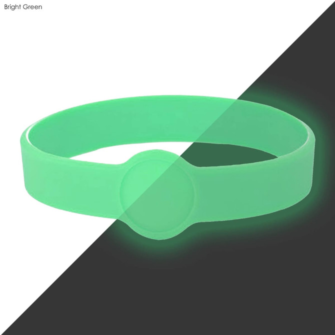 A bright green silicone wristband featuring a circular design, suitable for custom branding.