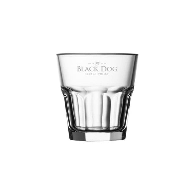 A drink bottle made of clear glass with a thick base and a branded logo for Black Dog Scotch Whisky.