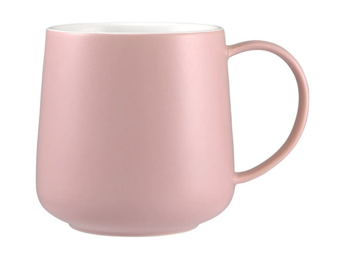 A pink ceramic coffee mug with a smooth finish and a curved handle. It features a white interior and has one logo.