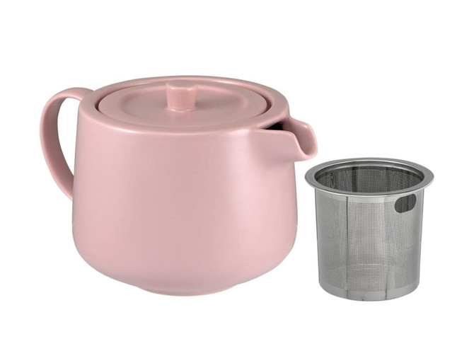 A pink teapot with a stainless steel infuser beside it. The set is gift boxed.
