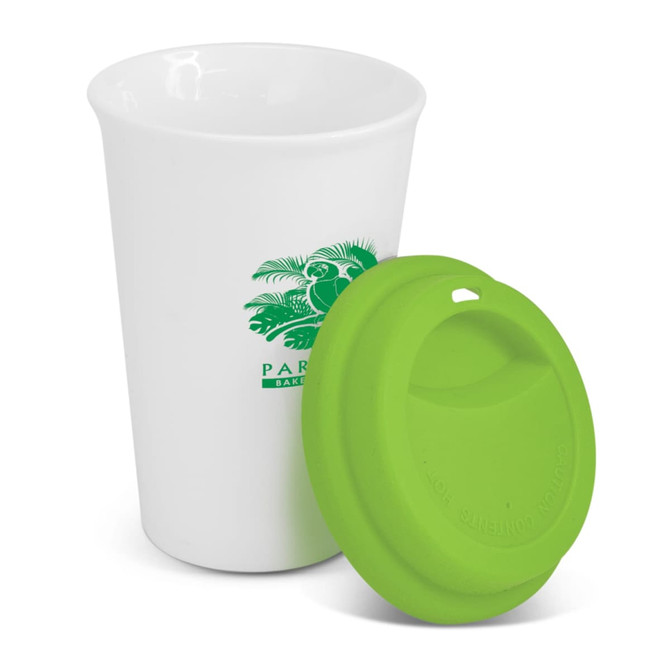 A white double wall coffee cup with a green silicone lid and a logo. The design features a smooth, modern shape.