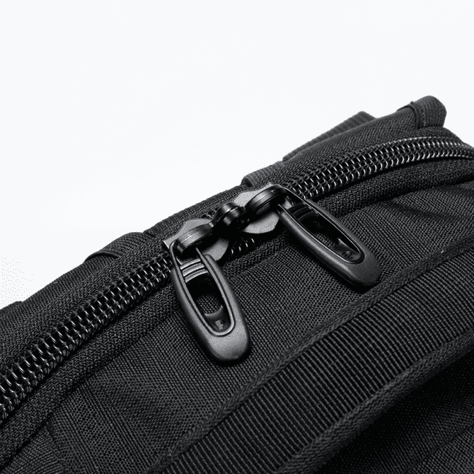 A black backpack featuring sturdy zippers and textured fabric details, with a logo present on the surface.