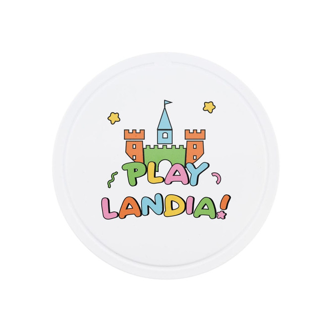 A round white game board featuring a castle design and colourful text spelling "PLAYLANDIA!" with decorative stars.