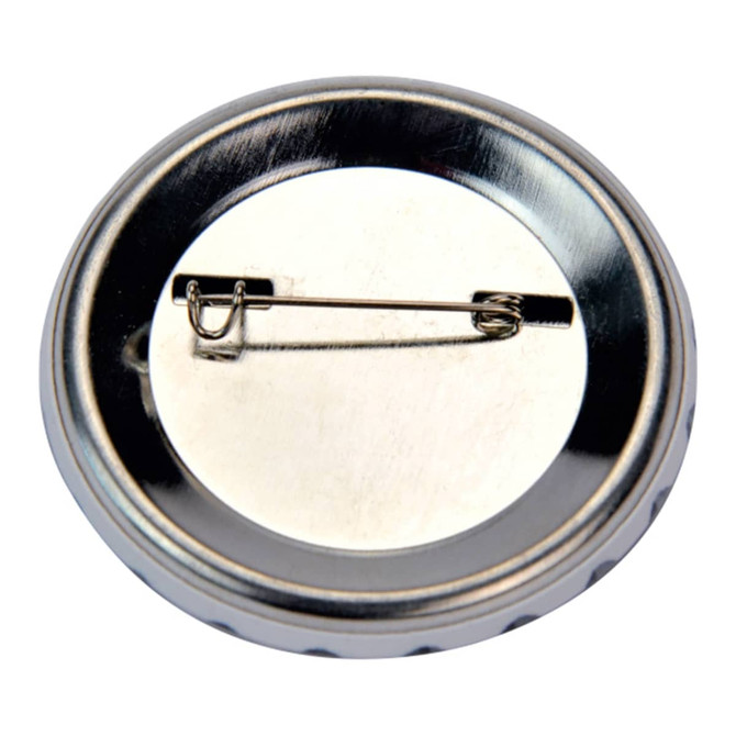 A round 75mm button badge with a metallic finish and a pin clasp on the back.