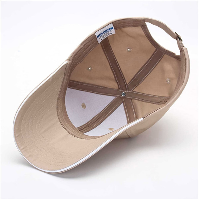 A cotton sandwich cap in a tan colour with a white peak, featuring internal stitching and a logo.