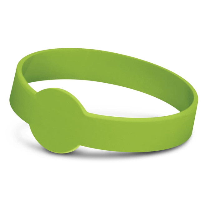 A bright green silicone wristband with a debossed design and a circular feature. It includes a logo.