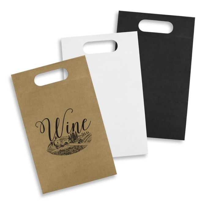 A set of three die cut paper wine bags in brown, white, and black with one featuring a wine graphic and handle.