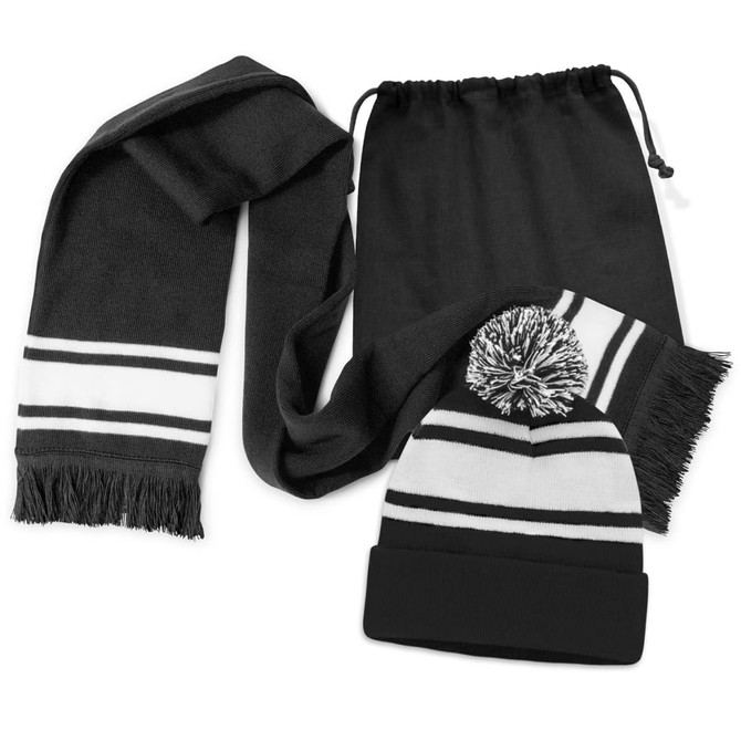 A black scarf with white stripes and a matching black beanie with a pom pom, both in a drawstring bag.