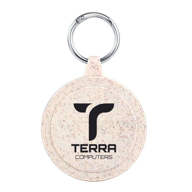 A circular keychain featuring a speckled design in cream and a logo in black.