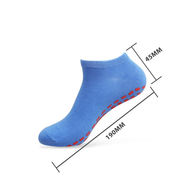 A pair of low cut gripper socks in blue, featuring red dotted grip patterns on the soles.