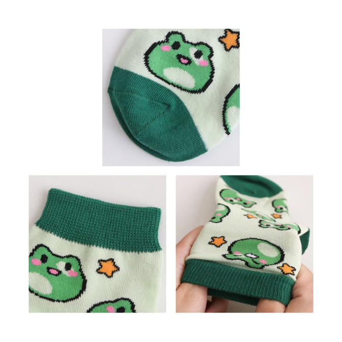 A pair of light green woven socks featuring frog designs and dark green accents, with a branding logo.