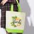 A canvas tote bag featuring a graphic design with the word "fresh", in cream and bright green colours, with a logo.